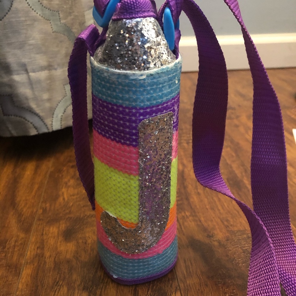A Justice water bottle holder.
